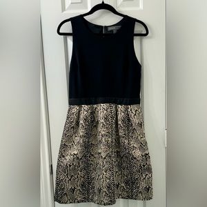 Used cocktail dress in black and silver/gold print